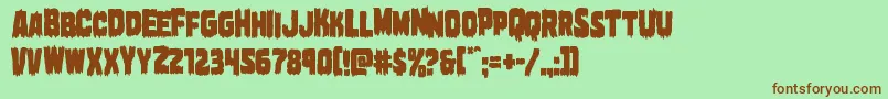 Marshthingcond Font – Brown Fonts on Green Background