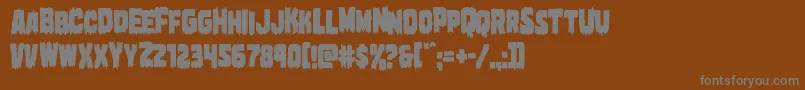 Marshthingcond-Schriftart – Graue Schriften auf braunem Hintergrund