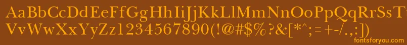 フォントBassetRegular – オレンジ色の文字が茶色の背景にあります。