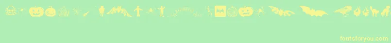 フォントVintageHalloween – 黄色の文字が緑の背景にあります