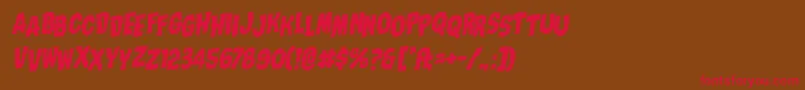 フォントNightmarealleystagrotal – 赤い文字が茶色の背景にあります。