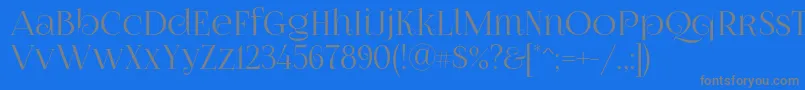 Foglihtenno07calt-Schriftart – Graue Schriften auf blauem Hintergrund