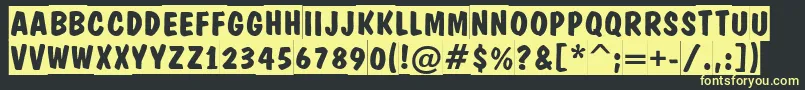 DominotitulslBold Font – Yellow Fonts on Black Background