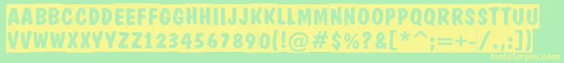 DominotitulslBold Font – Yellow Fonts on Green Background