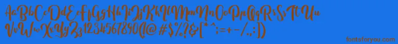 Fonte FitamintScript – fontes marrons em um fundo azul