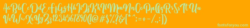 FitamintScript-Schriftart – Grüne Schriften auf orangefarbenem Hintergrund