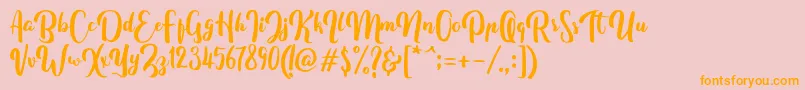 FitamintScript-Schriftart – Orangefarbene Schriften auf rosa Hintergrund