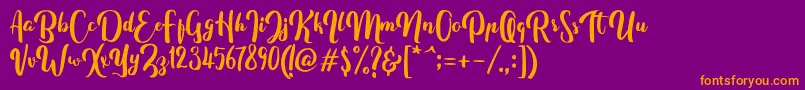 FitamintScript Font – Orange Fonts on Purple Background