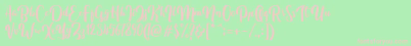 FitamintScript-Schriftart – Rosa Schriften auf grünem Hintergrund