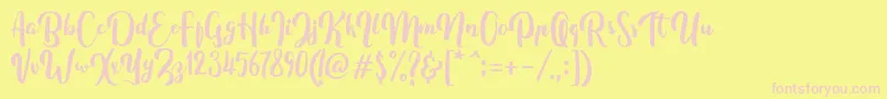 Fonte FitamintScript – fontes rosa em um fundo amarelo