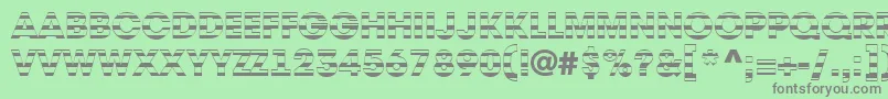 Czcionka AAvantetitulstrHeavy – szare czcionki na zielonym tle