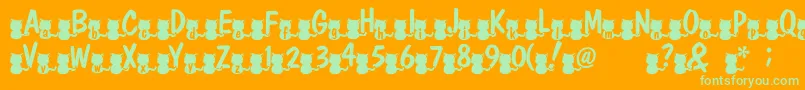 Nekofont Font – Green Fonts on Orange Background