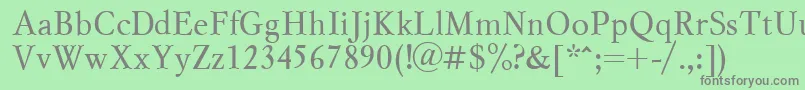 フォントMyslctt – 緑の背景に灰色の文字