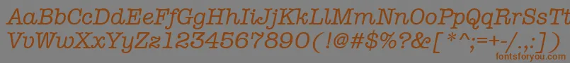 フォントAmtypewritermditcttРљСѓСЂСЃРёРІ – 茶色の文字が灰色の背景にあります。