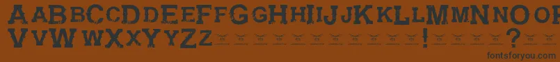 GunfighteracademyRegular Font – Black Fonts on Brown Background