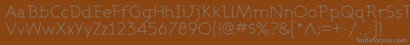Ashbl-Schriftart – Graue Schriften auf braunem Hintergrund