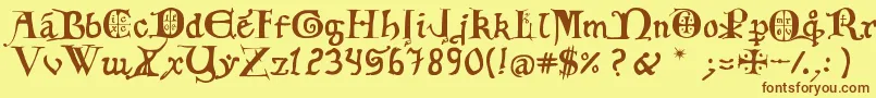 フォント12th C  Fancy Caps – 茶色の文字が黄色の背景にあります。