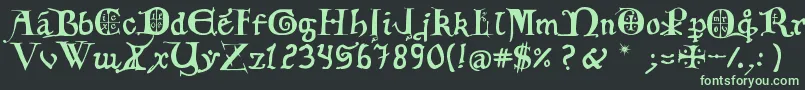 12th C  Fancy Caps Font – Green Fonts on Black Background