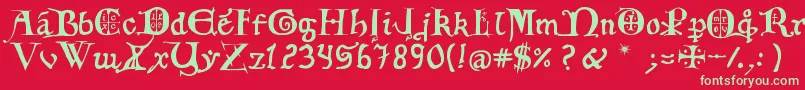 12th C  Fancy Caps Font – Green Fonts on Red Background