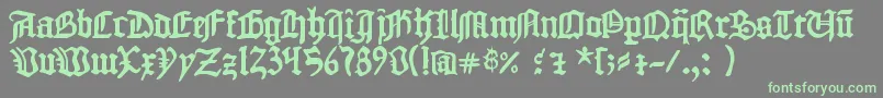 1454 Gutenberg Bibel-Schriftart – Grüne Schriften auf grauem Hintergrund