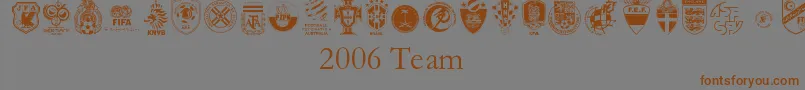 フォント2006 Team – 茶色の文字が灰色の背景にあります。