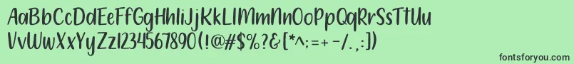 212 Moon Child Sans Font – Black Fonts on Green Background