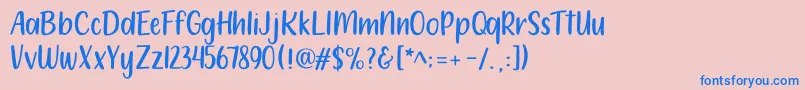 フォント212 Moon Child Sans – ピンクの背景に青い文字