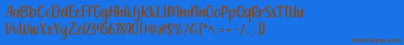 Fonte 212 Moon Child Sans – fontes marrons em um fundo azul