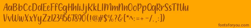 212 Moon Child Sans Font – Brown Fonts on Orange Background