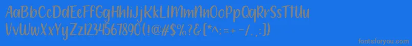フォント212 Moon Child Sans – 青い背景に灰色の文字