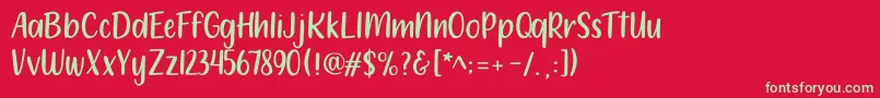 フォント212 Moon Child Sans – 赤い背景に緑の文字