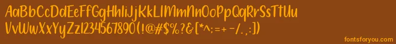 212 Moon Child Sans Font – Orange Fonts on Brown Background