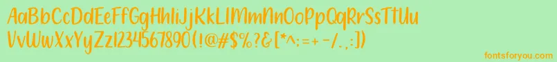 Fonte 212 Moon Child Sans – fontes laranjas em um fundo verde