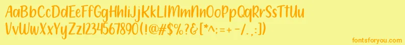 フォント212 Moon Child Sans – オレンジの文字が黄色の背景にあります。