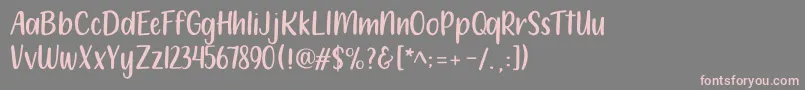 フォント212 Moon Child Sans – 灰色の背景にピンクのフォント