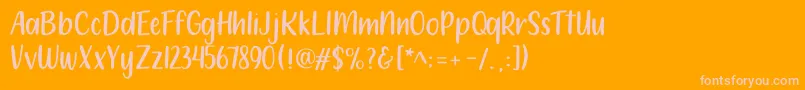 フォント212 Moon Child Sans – オレンジの背景にピンクのフォント