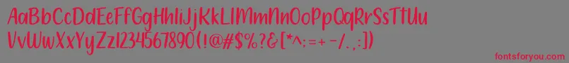 フォント212 Moon Child Sans – 赤い文字の灰色の背景
