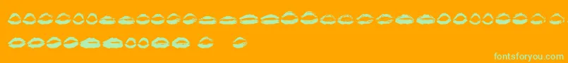 26 More Kisses  -Schriftart – Grüne Schriften auf orangefarbenem Hintergrund