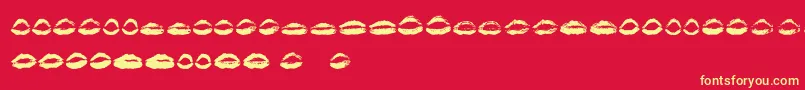 フォント26 More Kisses   – 黄色の文字、赤い背景