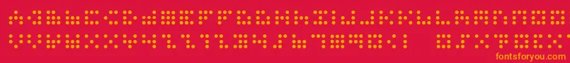 3x3dots-fontti – oranssit fontit punaisella taustalla