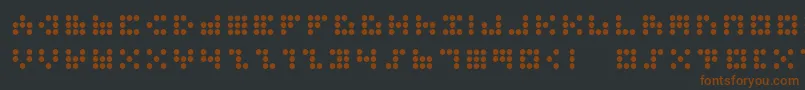 3x3dotsb-fontti – ruskeat fontit mustalla taustalla