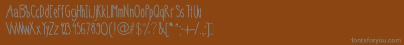 Más sobre la fuente 0,75 fuente 0,75 – Fuentes Grises Sobre Fondo Marrón