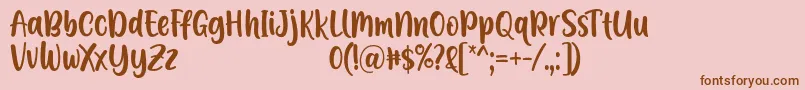Czcionka A Calling Font D by 7NTypes – brązowe czcionki na różowym tle
