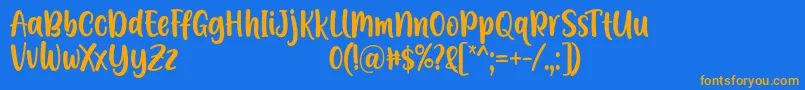 A Calling Font D by 7NTypes-fontti – oranssit fontit sinisellä taustalla