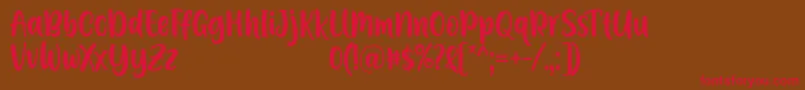 A Calling Font D by 7NTypes-fontti – punaiset fontit ruskealla taustalla
