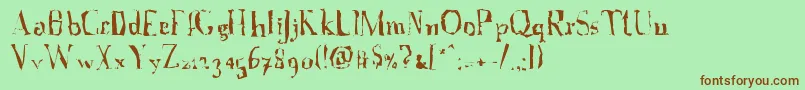 A Font with Serifs  Disordered Font – Brown Fonts on Green Background