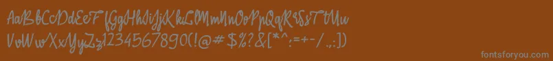 フォントABasterRules – 茶色の背景に灰色の文字