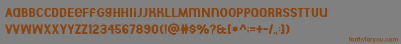 フォントAberforth Demo – 茶色の文字が灰色の背景にあります。