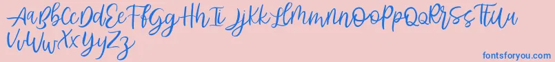 Abhyaksa FREE-Schriftart – Blaue Schriften auf rosa Hintergrund