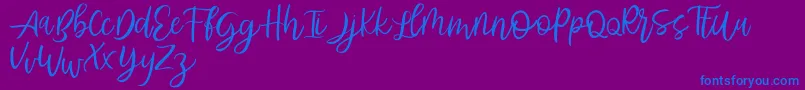 Abhyaksa FREE-Schriftart – Blaue Schriften auf violettem Hintergrund